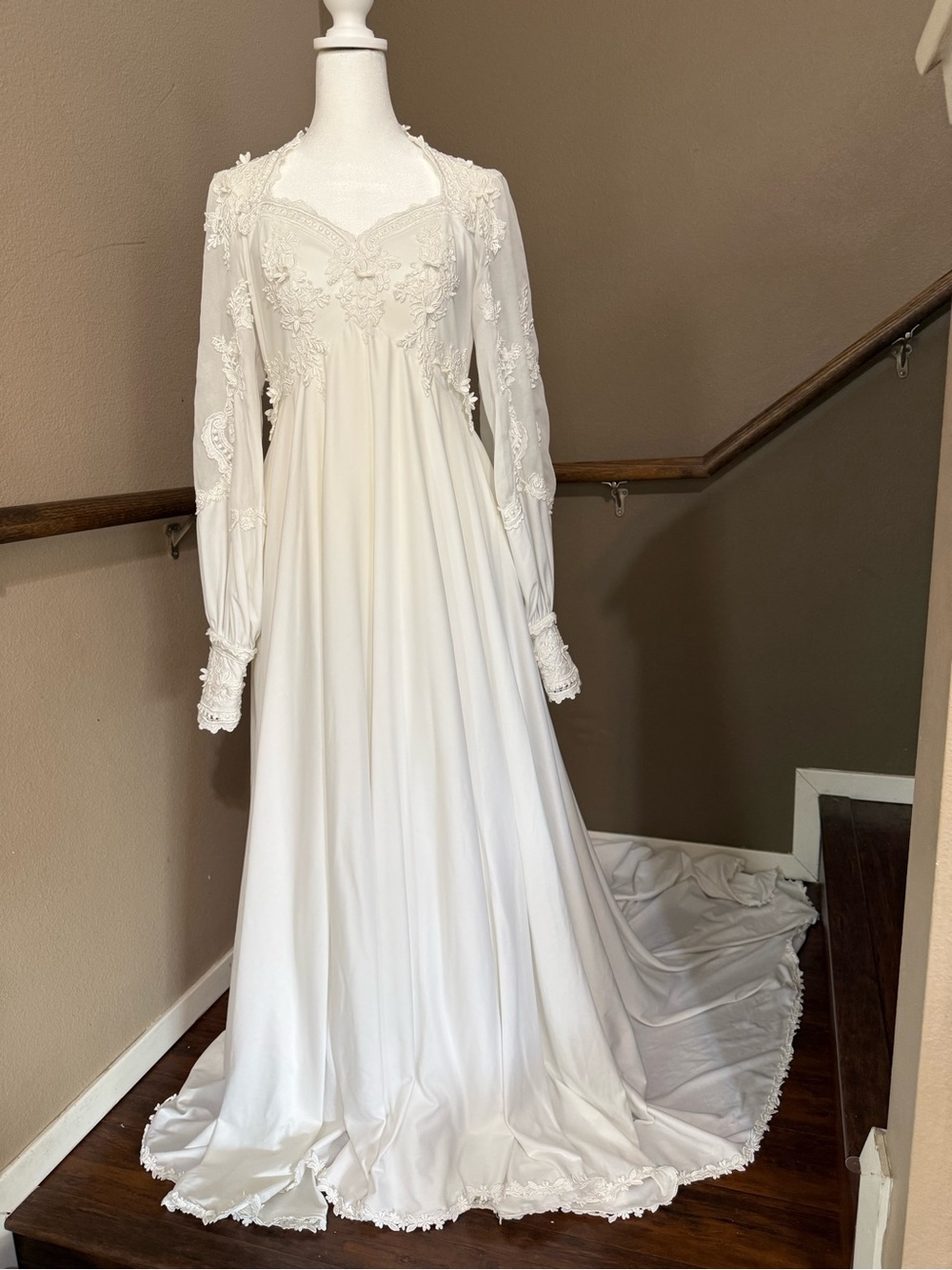 Elegant Ivory Long-Sleeve Wedding Dress with Lace Appliqué